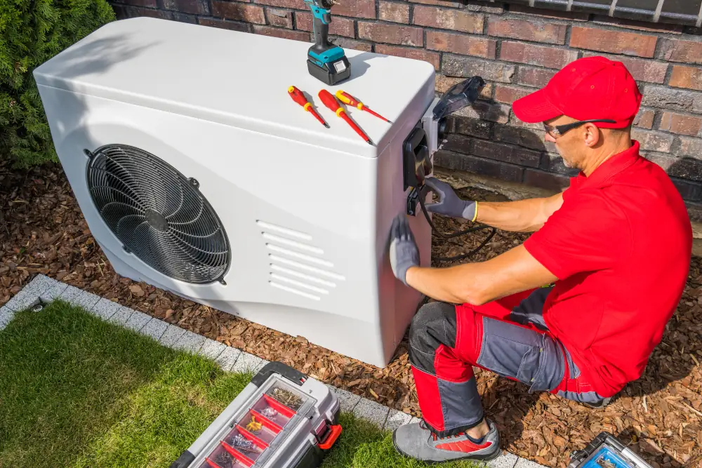 HVAC upgrades options - Technician Installing A Heat Pump Unit