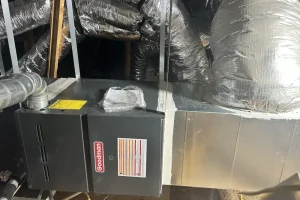 Technician Checking up a heating System - Picture of a heating system