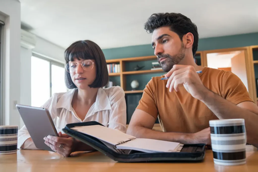 couple making choice on HVAC Maintenance Plans