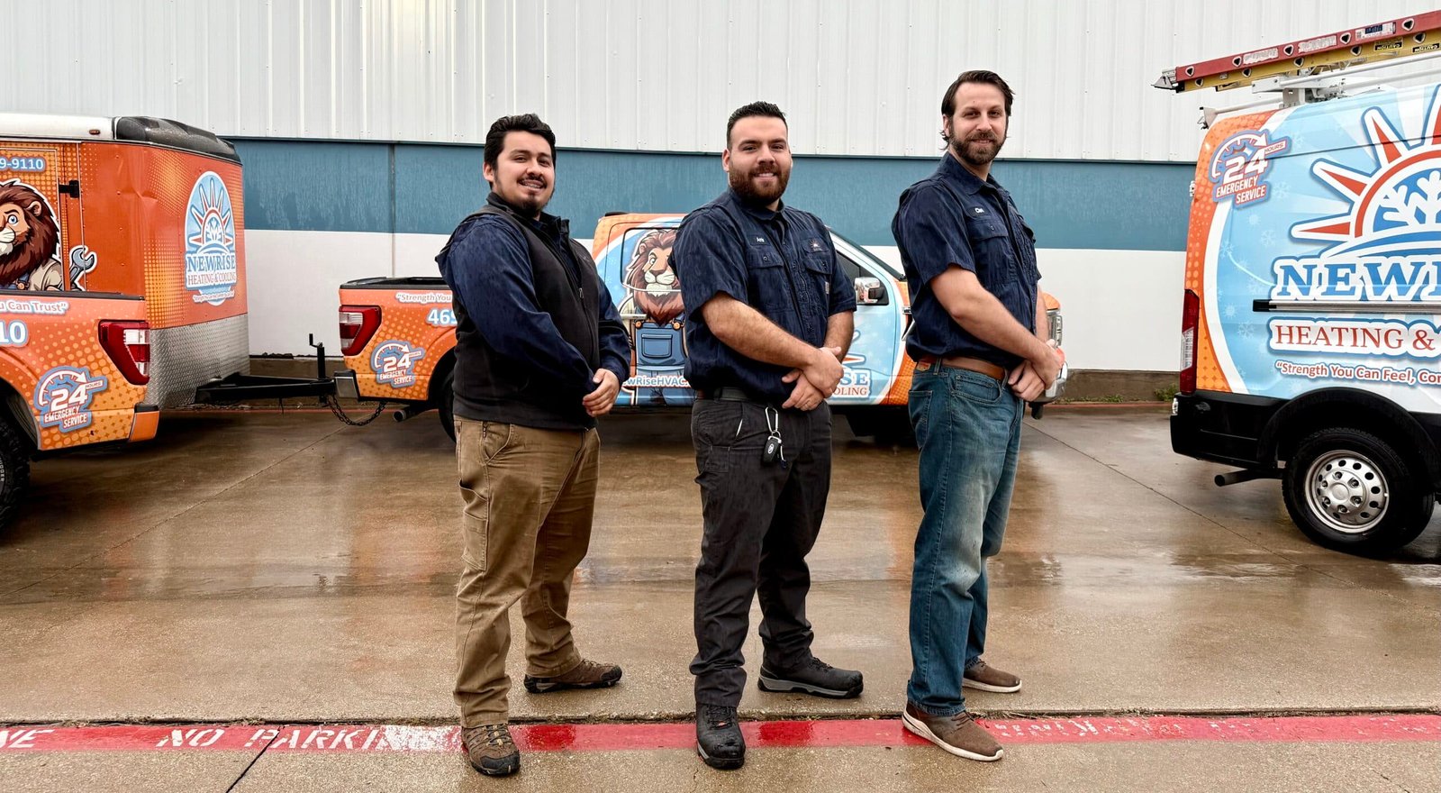 NewRise HVAC team standing in front of their trucks